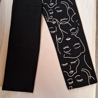 Jeans neri con stampa volto, taglia L