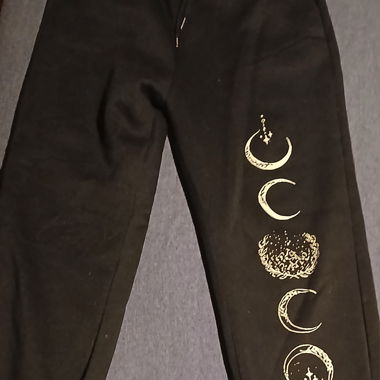 Pantaloni da jogging neri con stampa luna