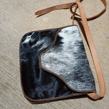 Borsa a tracolla in pelle e pelle di vacca
