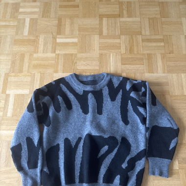 Grau schwarze Sweatshirt 