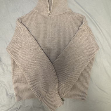 Maglione in maglia beige con zip
