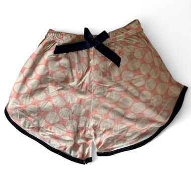 Pink and white polka dot shorts