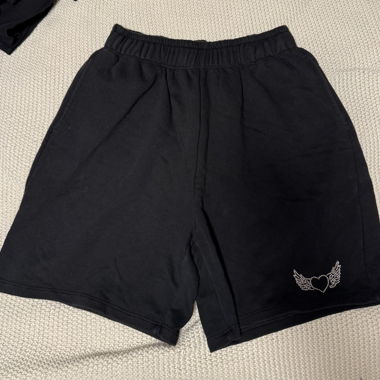 Short fabric shorts with glitter
