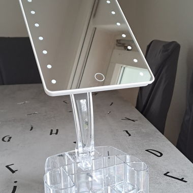 Mirror with light and storagr
