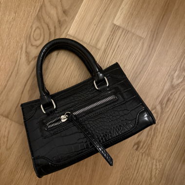 Kleine schwarze Handtasche