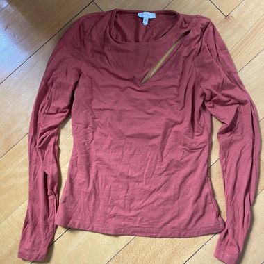 Red long-sleeve top with neckline