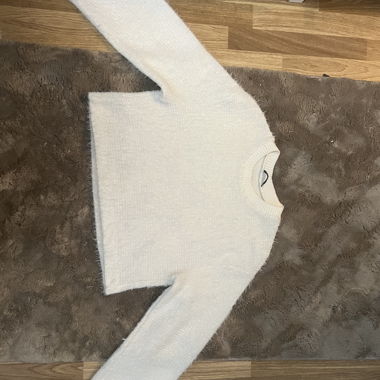Pull blanc duveteux