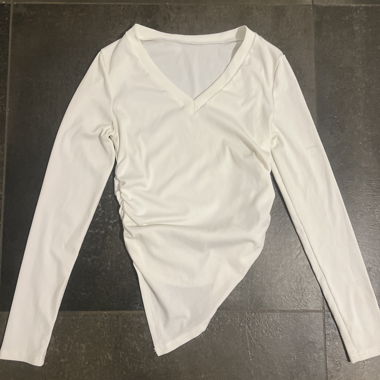 Elegant white long sleeve top