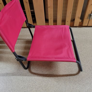 Pink folding lounge chair lake beach picnic