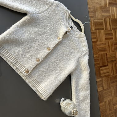 Cardigan bouclé color crema 