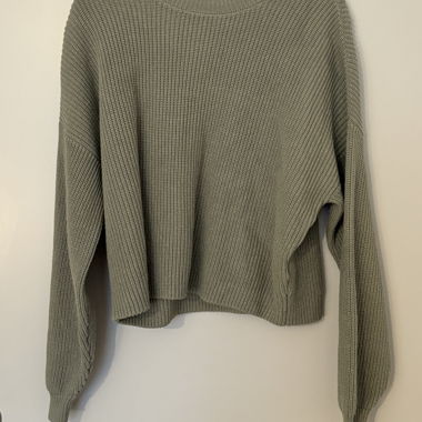 Grüner Strickpullover mit weitem Schnitt