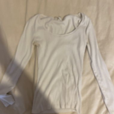 Top bianco a maniche lunghe