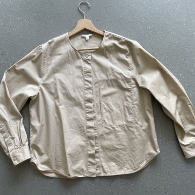 Beige COS blouse with round neckline
