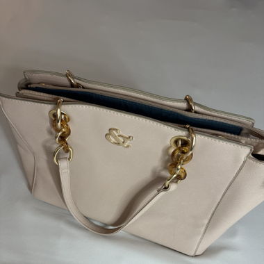 rose purse with turquoise lining