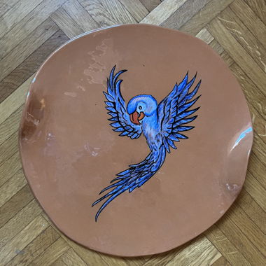 Homemade parrot ceramic.