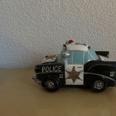 Geldkasse Polizeiauto