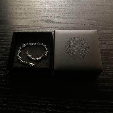 Silver bracelet with green stones