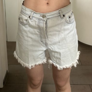 short en jean Levis avec franges