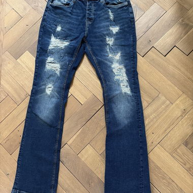 Dunkelblaue Destroyed Jeans