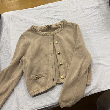 Beige knitted cardigan with gold buttons