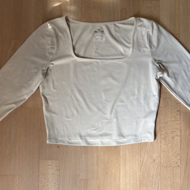 Top bianco a maniche lunghe