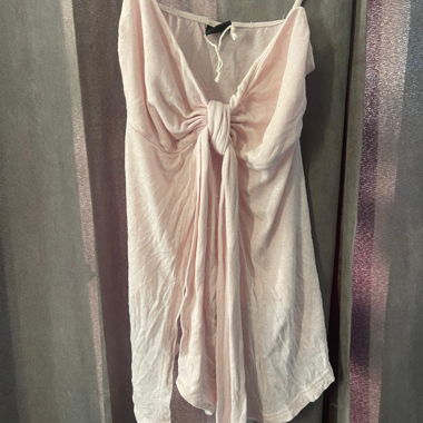 Top rosa Ginatricot con fiocco