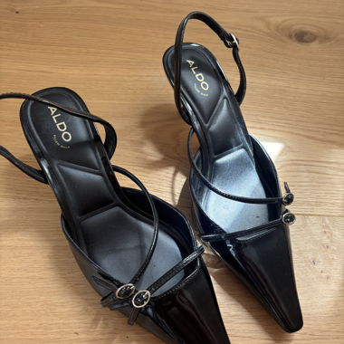 Aldo Schwarze Slingback-Pumps