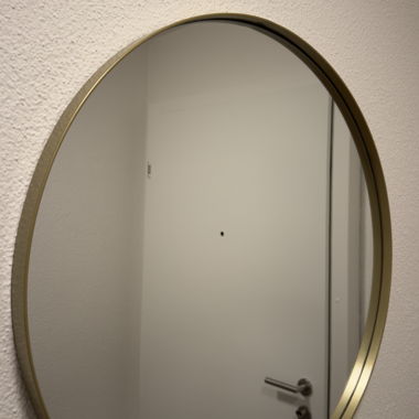 Specchio da parete ovale con cornice dorata