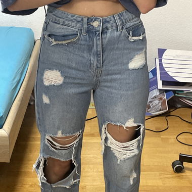 Blaue denim mit löcher