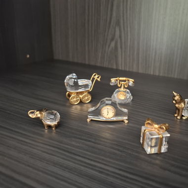 Figurines en cristal et acier 