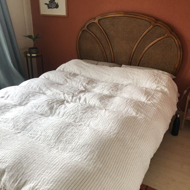 Vintage double wooden bed with slatted base