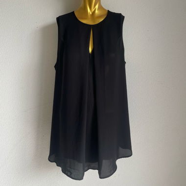 Blouse noire fluide – Légère et élégante