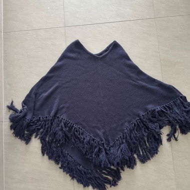 Poncho con frange