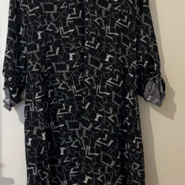Black geometric print tunic blouse