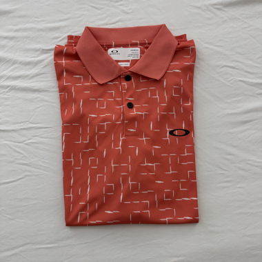 Polo Oakley rossa da golf