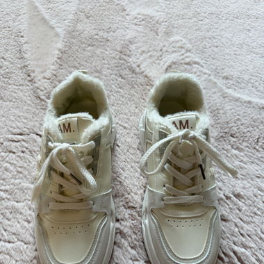 AM. Shoes white and fluffy
