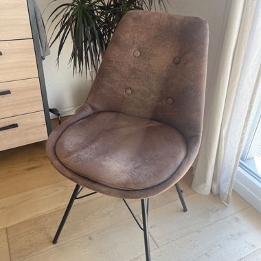 Brown upholstered armchair