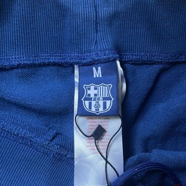 Entraîneur de football, pantalons
