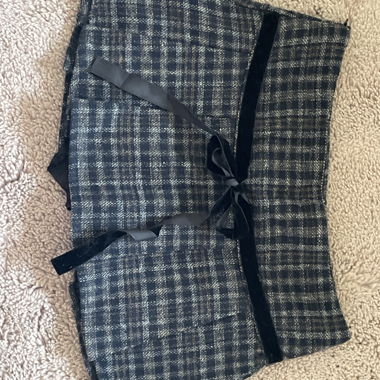 Mini gonna con pantaloni