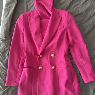 Pink blazer and trousers