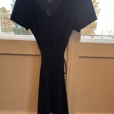 Black dress with small white polka dots and belt