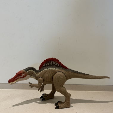 Dinosaurier-Spielfigur braun/rot