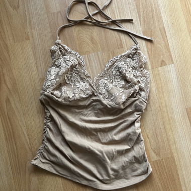 Top in pizzo con spalline annodabili