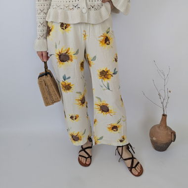Pantaloni con stampa di girasole taglia XS