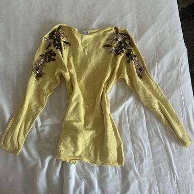 Yellow sweater with floral details
