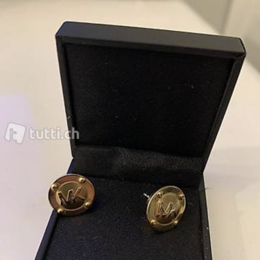 Orecchini a bottone dorati Mk