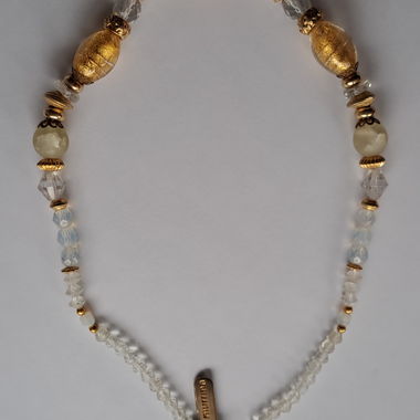 Halskette mit goldenen und durchscheinenden Murano-Perlen 