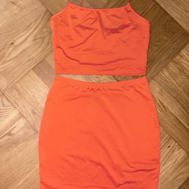 Neon orange two-piece top & skirt