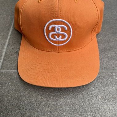 Cappellino snapback arancione Stussy