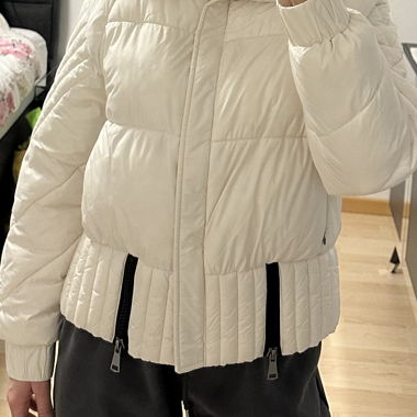 White quilted jacket with fur hood